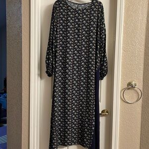 Maxi dress with asymmetrical detail in front of the dress. Size 1X